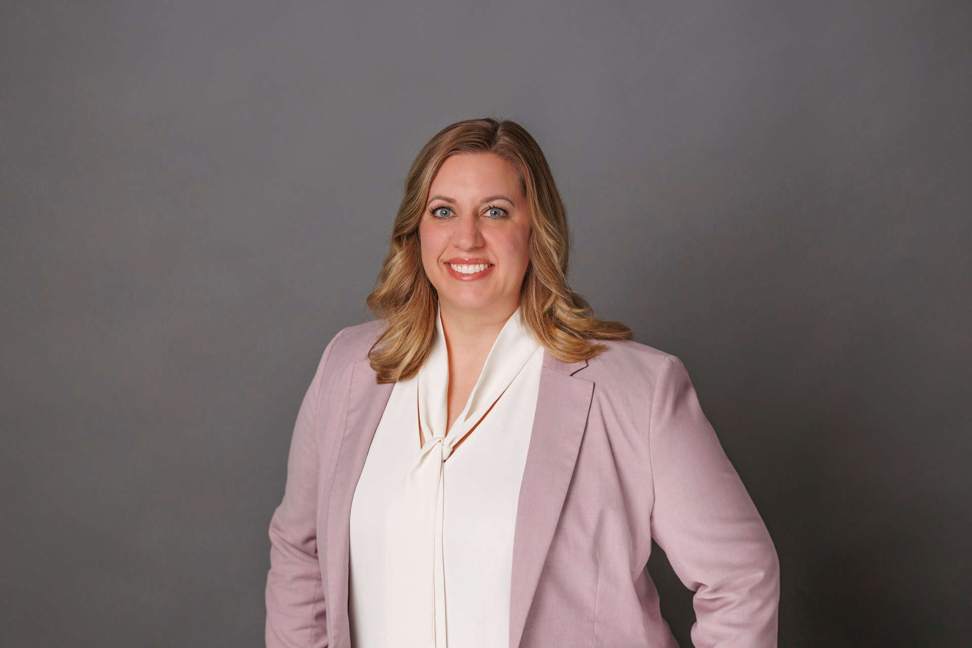 Regional education office staff member at Grundy/Kendall, professional portrait for school administration.